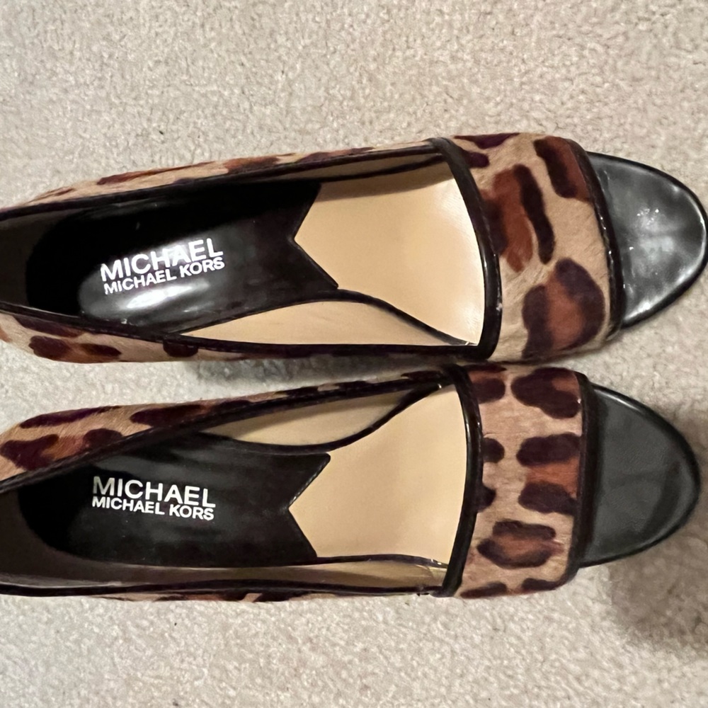 Michael Kors animal print wedge heels.